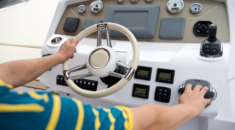 Image of person steering their boat