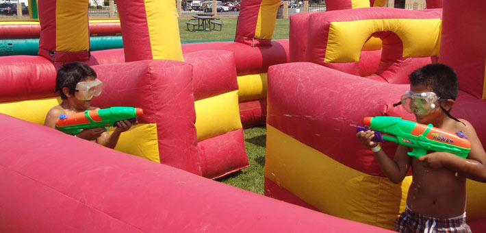 Children playing with  water guns